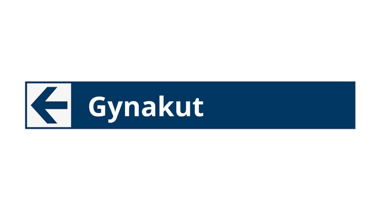En skylt för åt vilket håll gynakuten ligger.